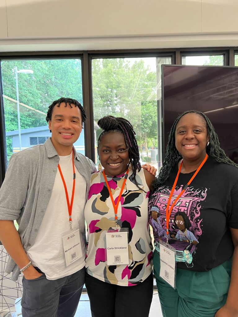 CS Everyone team members Michael Johnson, Carla Strickland, and Nykema Lindsey pose for the camera.